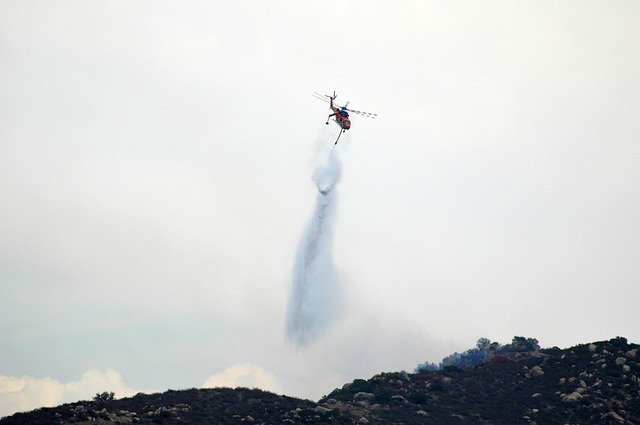 Choppers collide, killing 2, as fires and foreboding grip Greece