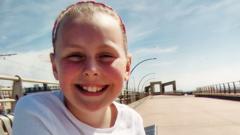 Family 'devastated' by death of girl, 9, as man charged with murder