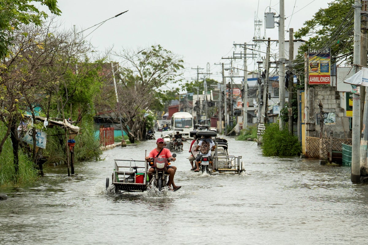 Super Typhoon Ragasa barrels through Philippines as rescuers work through night to evacuate residents