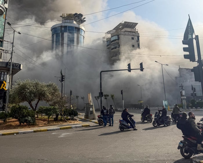 ‘The memories stay behind’: hundreds of thousands flee the Israeli bombs in Beirut