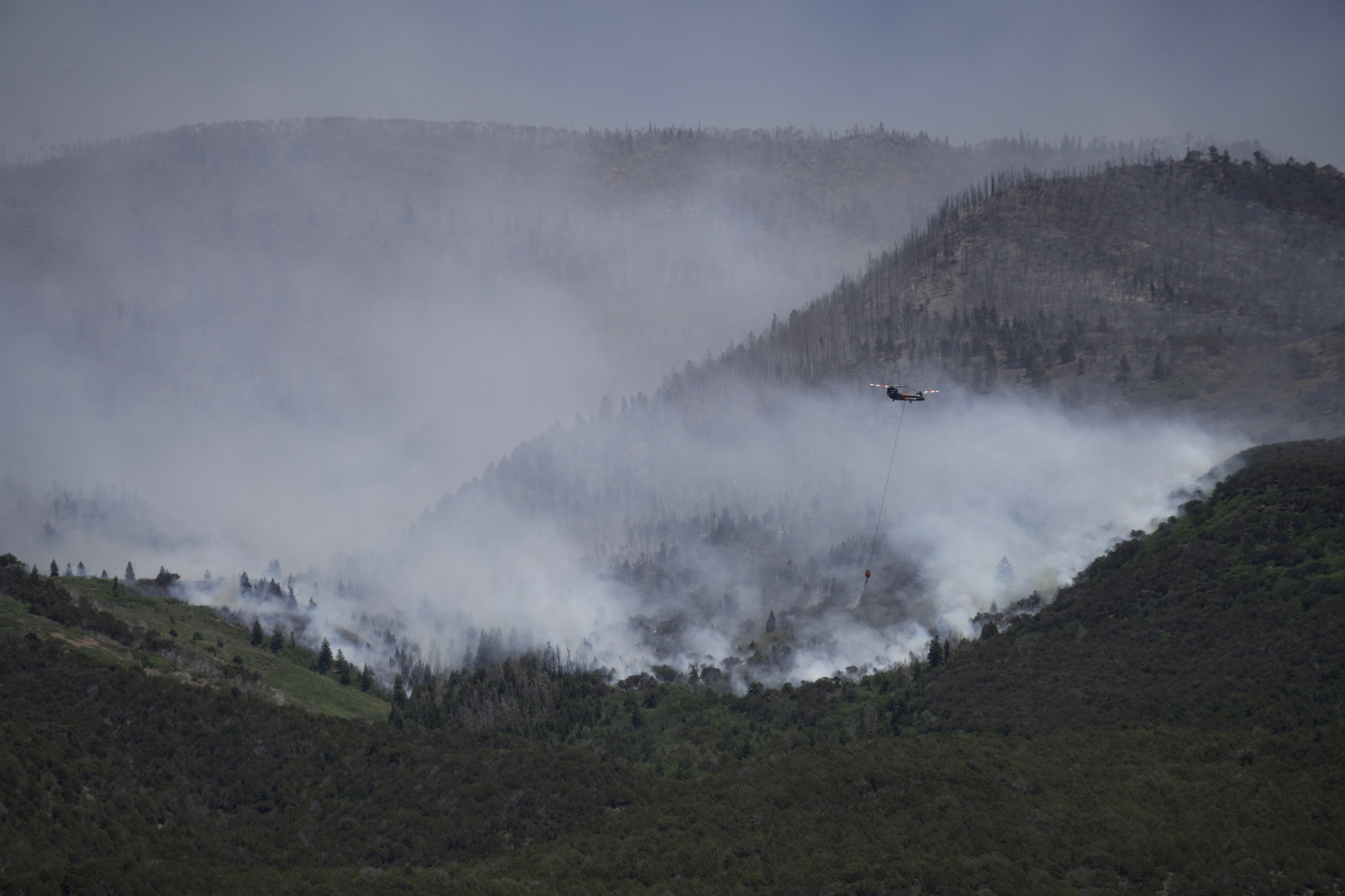 Three firefighters killed on Colorado-Utah border as wildfires intensify