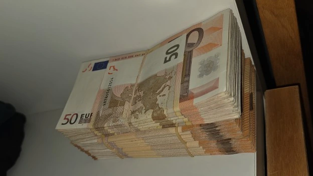 Politie vindt 340.000 euro cash en wapens in slaapkamer Zutphenaar