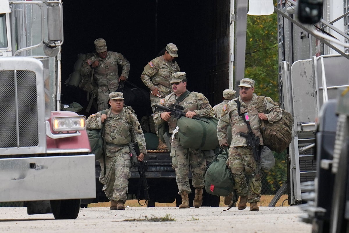 Texas National Guard members arrive in Illinois despite lawsuit and opposition from local leaders over Trump’s crackdown