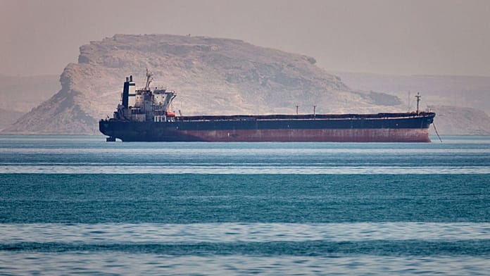 Ship hit in Hormuz as Iran's top negotiator says strait to stay shut