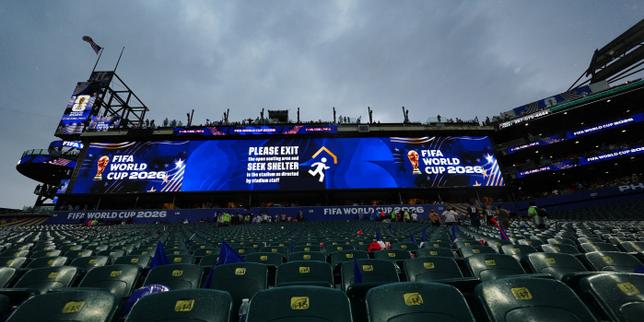 France-Iraq World Cup game restarts after two-hour storm delay