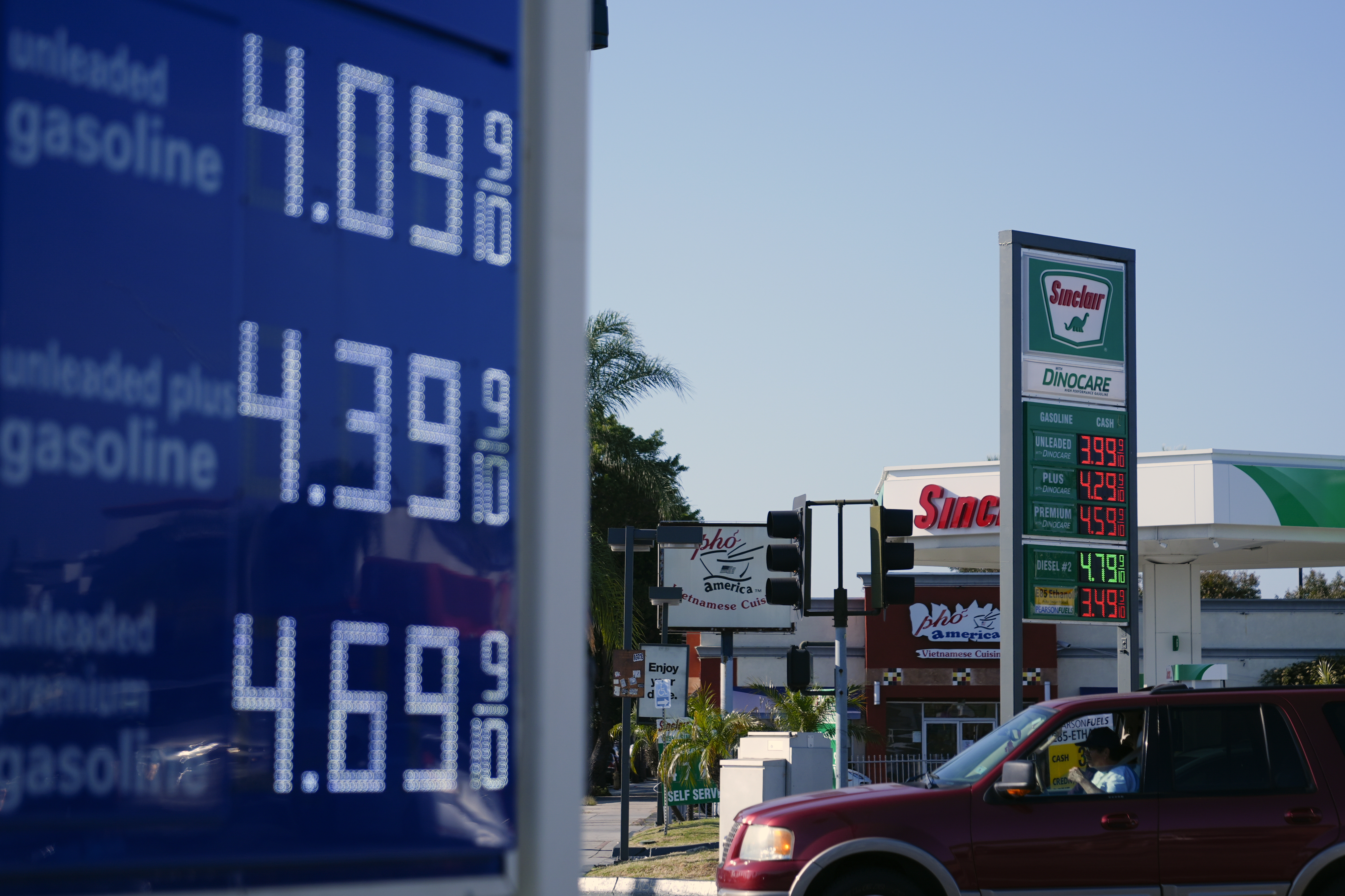 Gasoline's hit to Americans' wallets expected to hit a 20-year low
