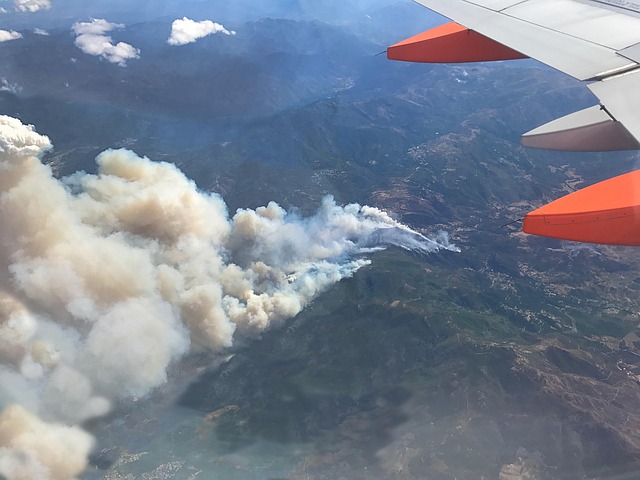 Pilot reports possible burn injuries after passenger's laptop catches fire