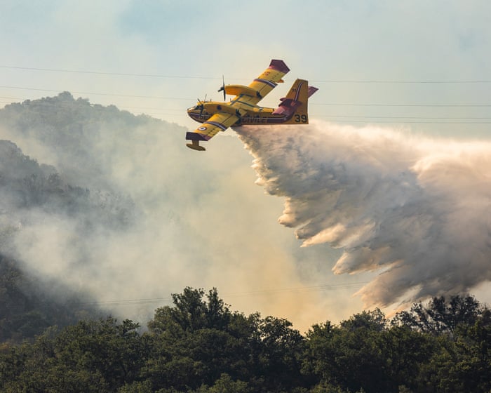 Wildfires rage across southern Europe, forcing thousands to flee homes