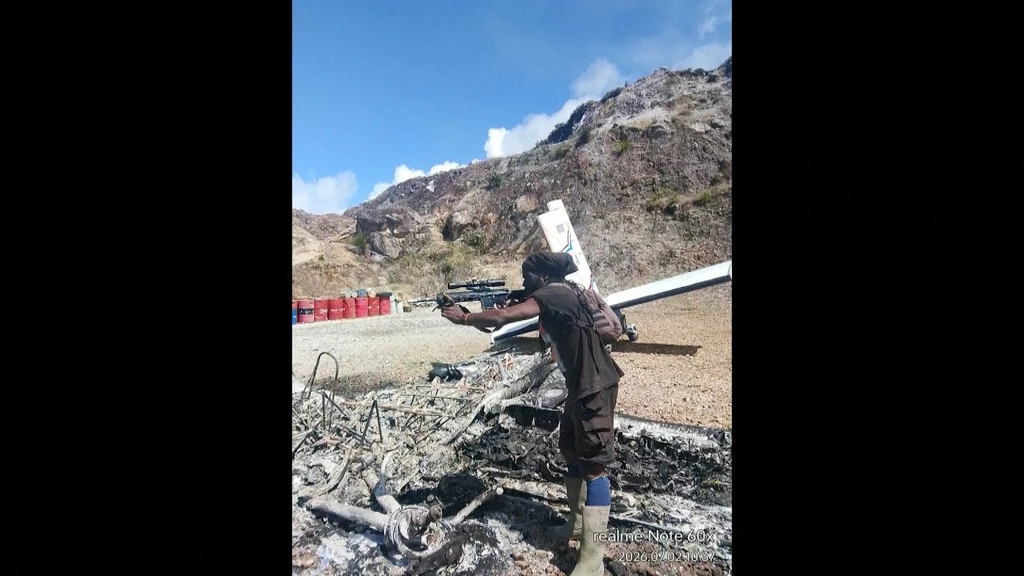 Amerikaanse piloot doodgeschoten door rebellen in Papoea, Indonesië bergt lichaam
