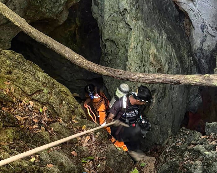 ‘Essentially diving in coffee’: Australian diver among team rushing to rescue people trapped in flooded Laos cave