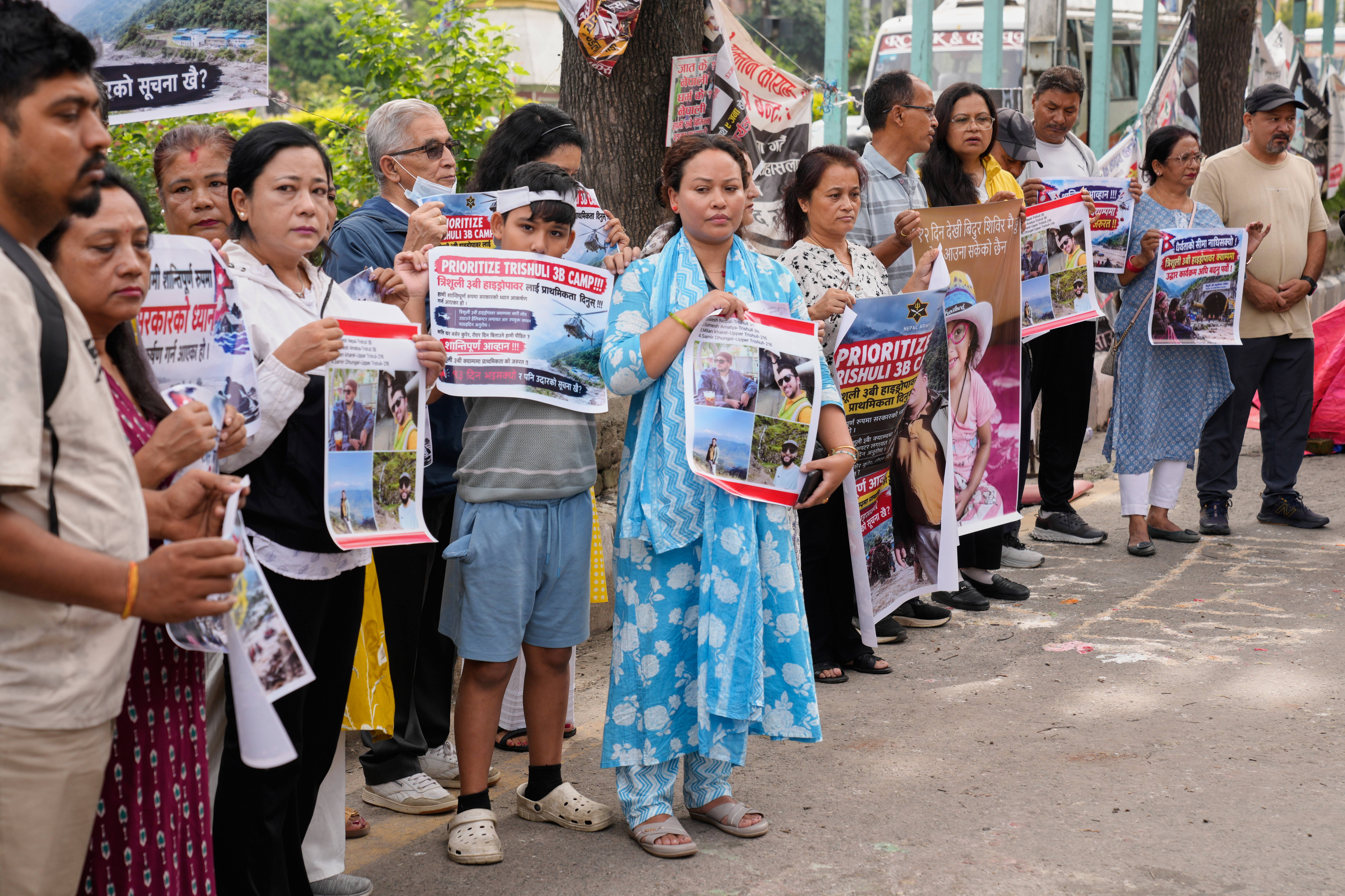 As Nepal identifies those killed in the floods, questions grow over China's reporting