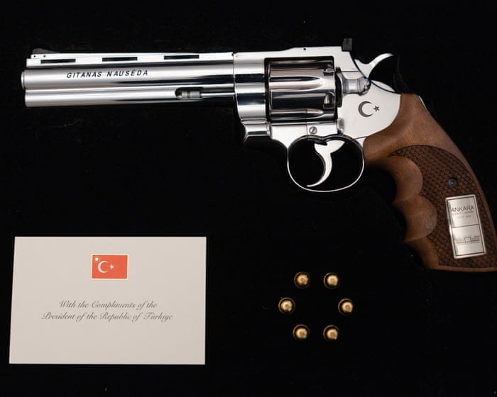 Nato leaders surprised by Turkish president’s gift of guns after summit