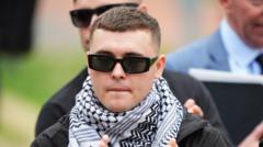 Prosecutors to challenge decision to throw out terror case against Kneecap rapper