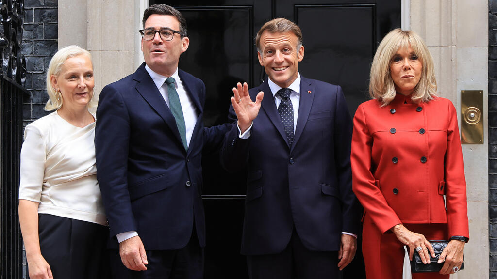 British, French leaders hold talks on migrants and EU relations