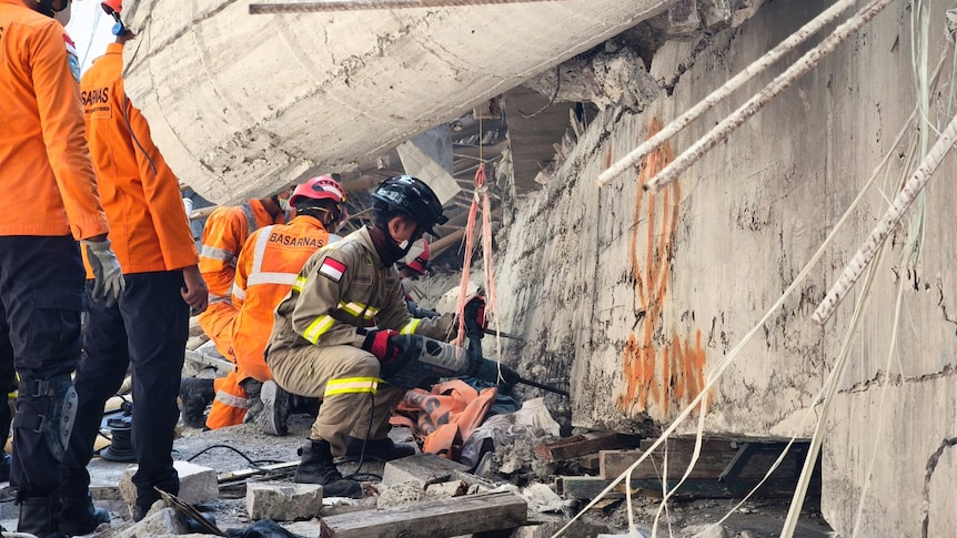 At least 63 killed in Indonesian school collapse with others still missing