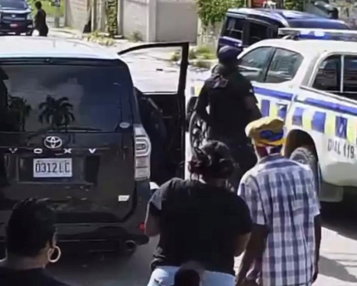 Jamaican police officer charged with murder after woman shot during protest