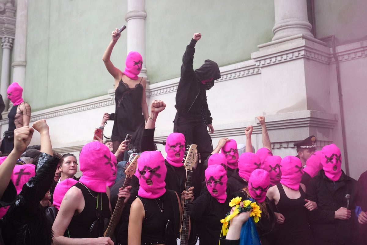 Pussy Riot stage protest blocking access to Russian pavilion at Venice Biennale