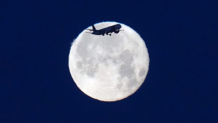 Rare Strawberry Moon shines over Lisbon