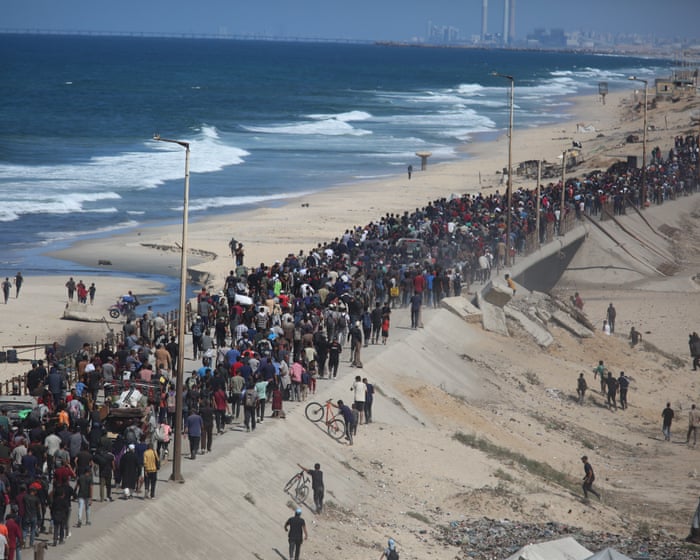 Palestinians displaced to southern Gaza begin journey home as ceasefire comes into effect
