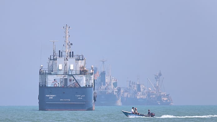 Cargo ship hit by projectile in Hormuz as Iran issues renewed passage warning