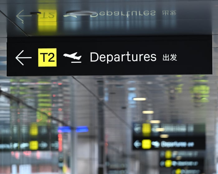 Man arrested attempting to board international flight at Melbourne airport charged with murdering woman