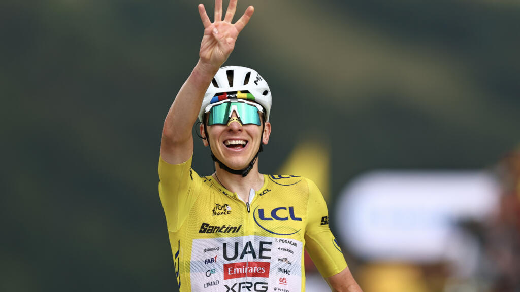 Pogacar wins 'unforgettable' Tour de France 14th stage to extend overall lead