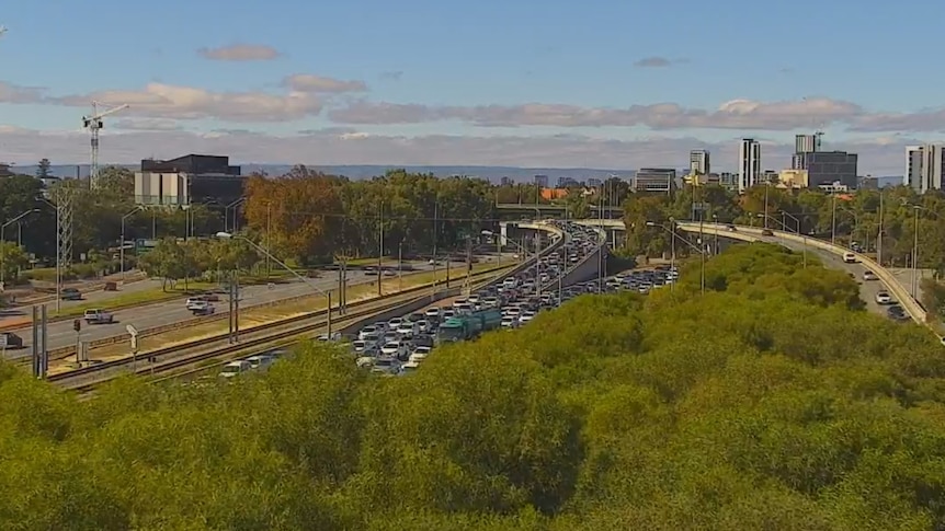 Man, 18, dies after car rolls over on Perth's Mitchell Freeway