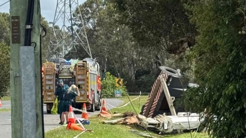 Man dies after crane hits powerlines and rolls over