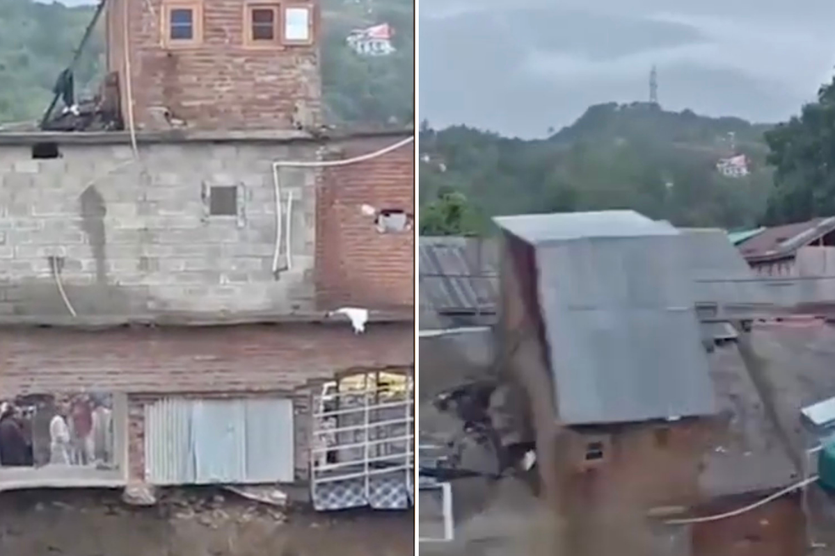 Entire row of shops dragged underwater in powerful flooding