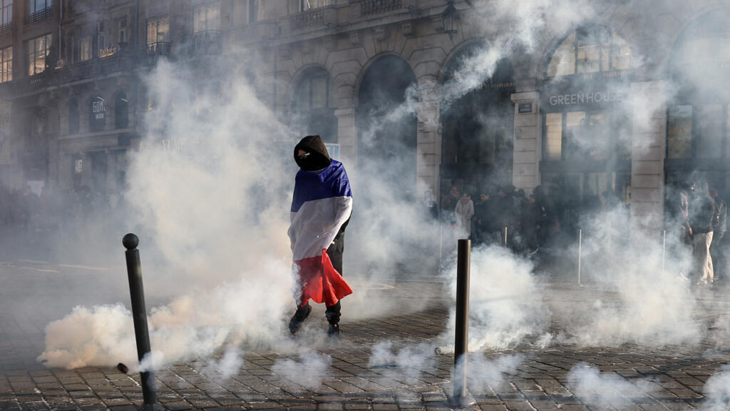 French PM calls for partial curfews after weekend of violence, looting