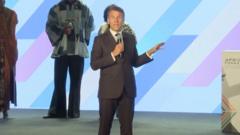 Watch: Macron interrupts speaker to tell audience to be quiet