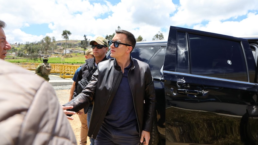Ecuadorians filmed throwing rocks in 'presidential assassination attempt'