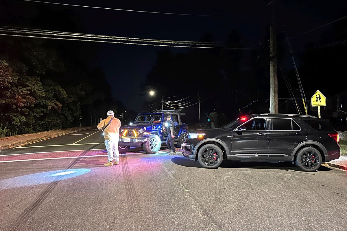 One dead and several others injured in mass shooting at New Hampshire country club as suspect detained, police say