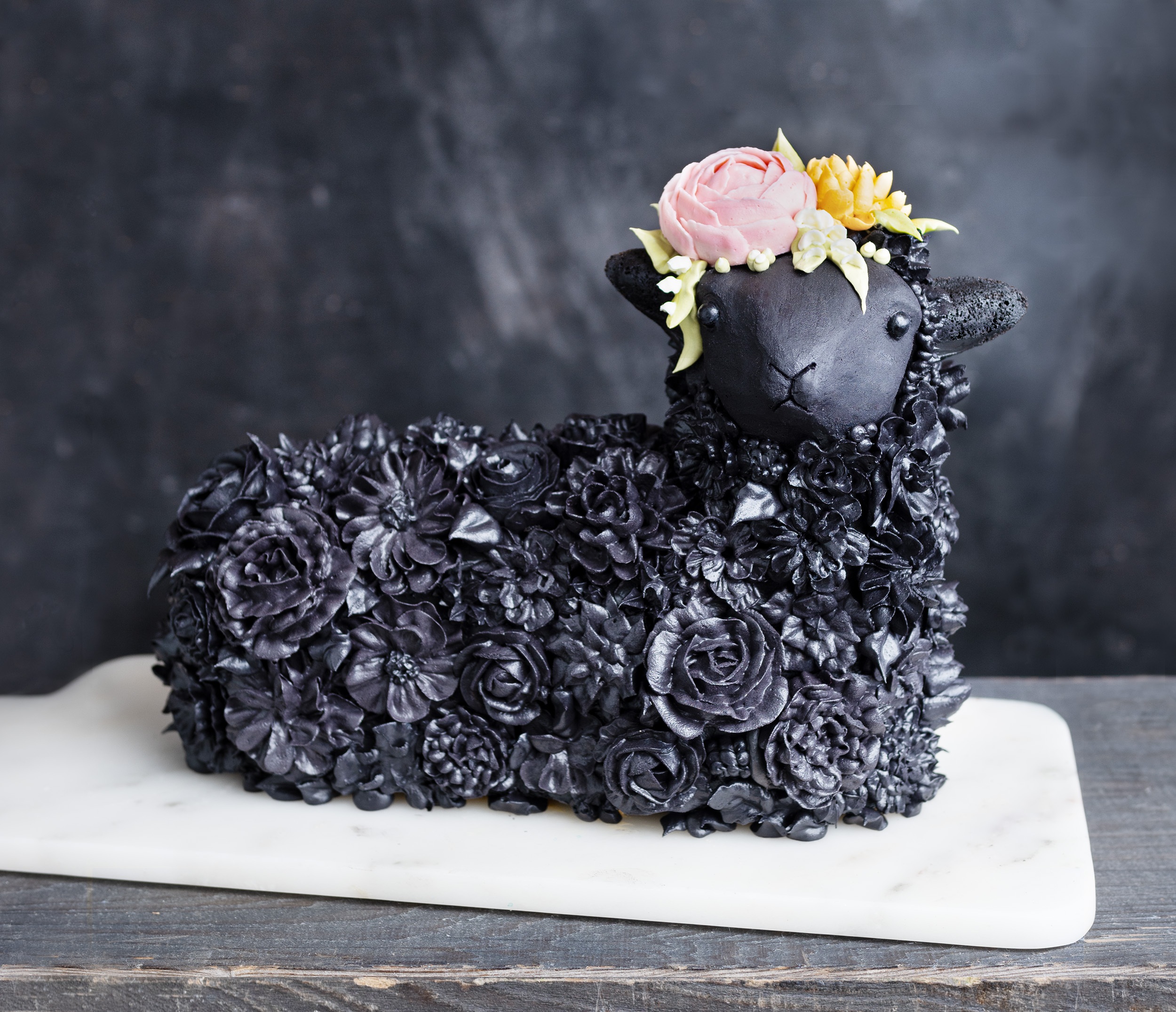 Buttercream wool and jelly bean eyes: The art of the Easter lamb cake