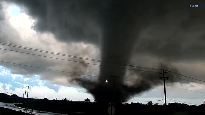 Powerful tornado tears across Oklahoma, damaging homes and blocking roads