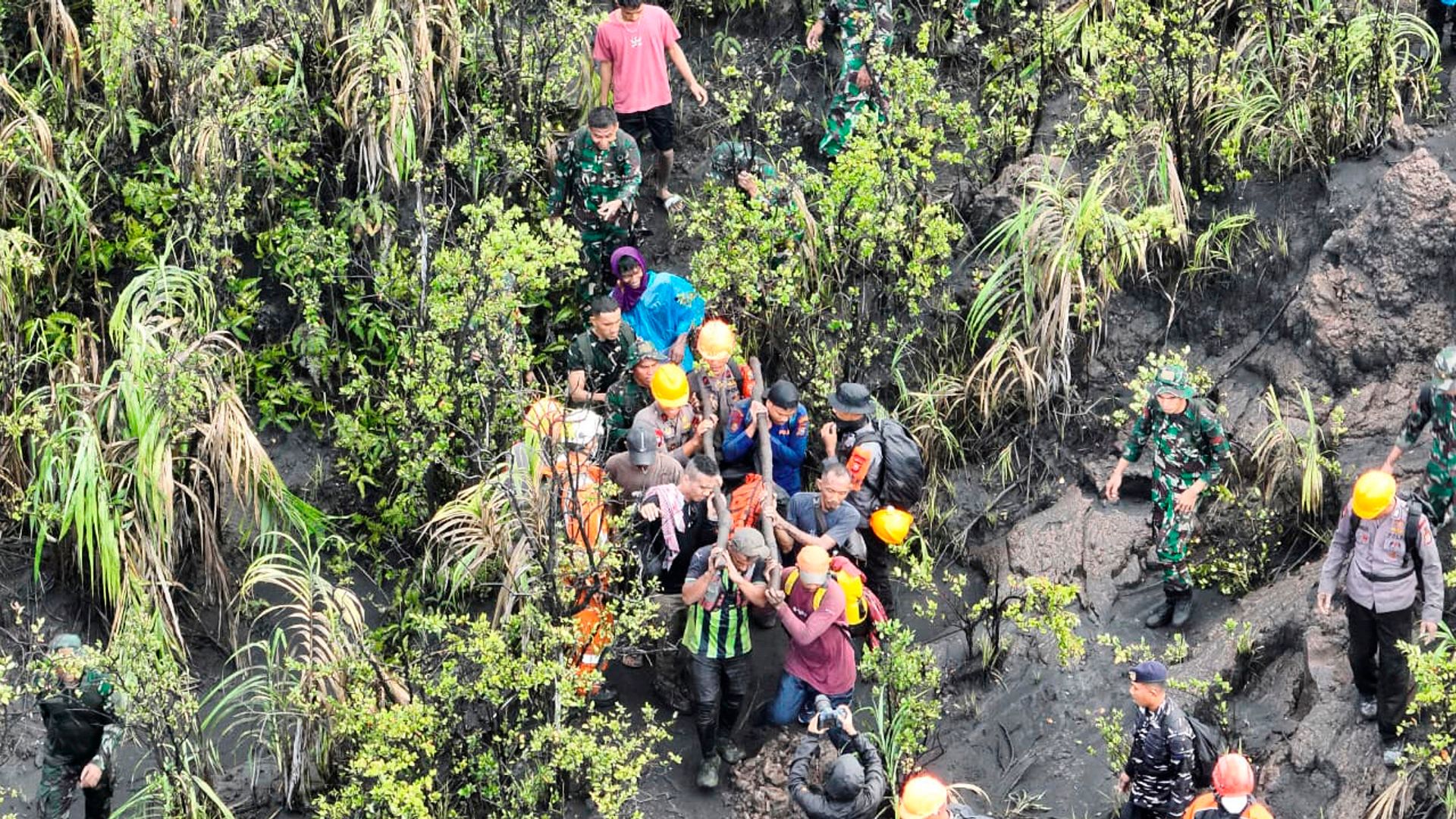 Bodies of missing hikers found in each other's arms after volcano erupts