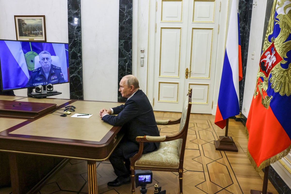 Putin hails Russia's test launch of a new ballistic missile and calls it the world's most powerful
