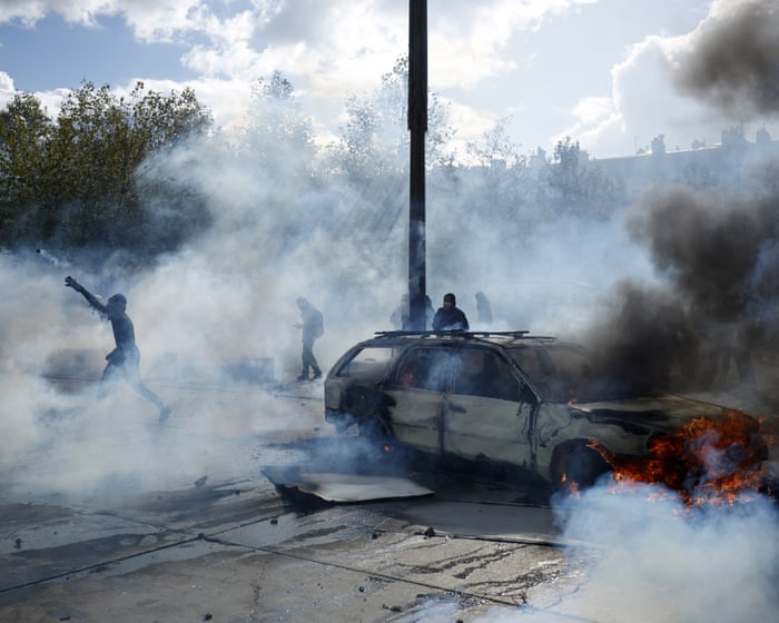 More than 400 arrested as police clash with protesters across France