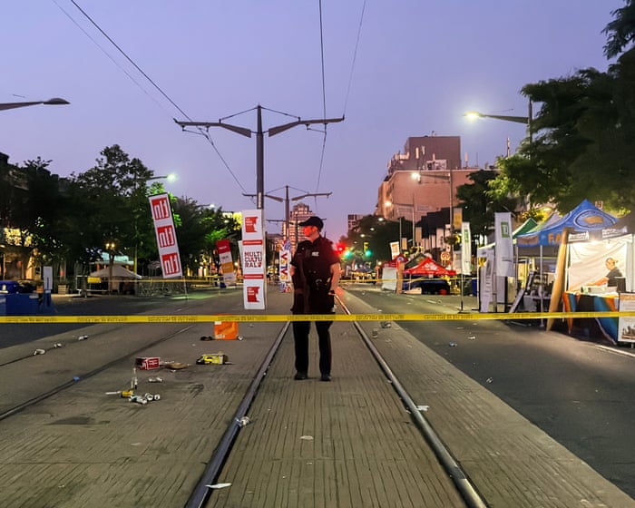 Toronto shooting: two dead and four injured near street festival, with suspect still at large